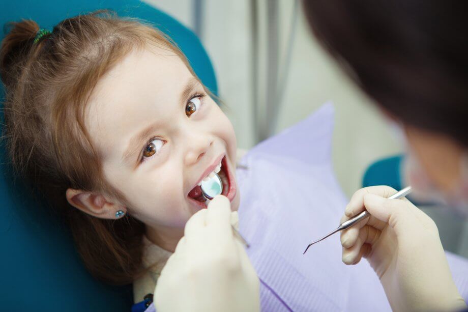 child visiting dentist