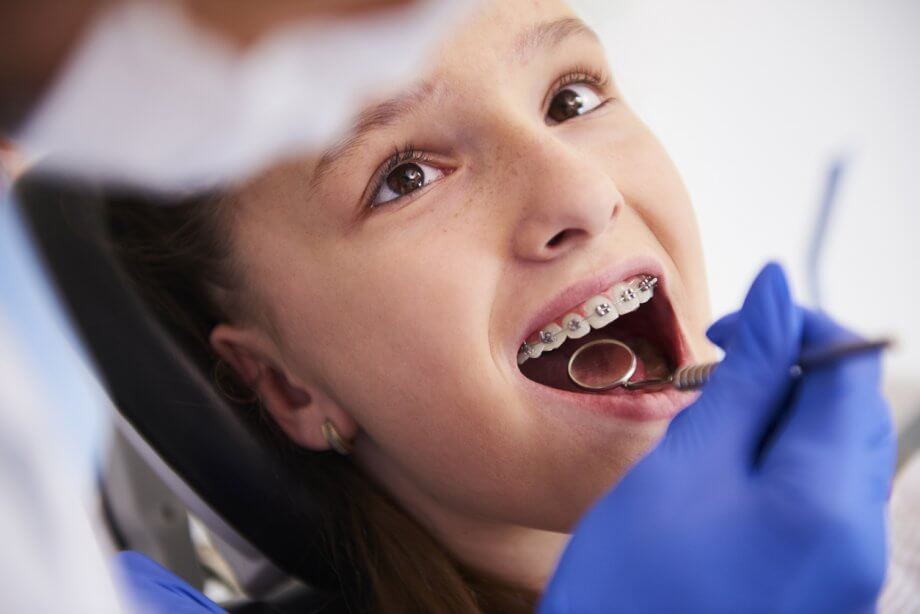 girl with braces at appointment