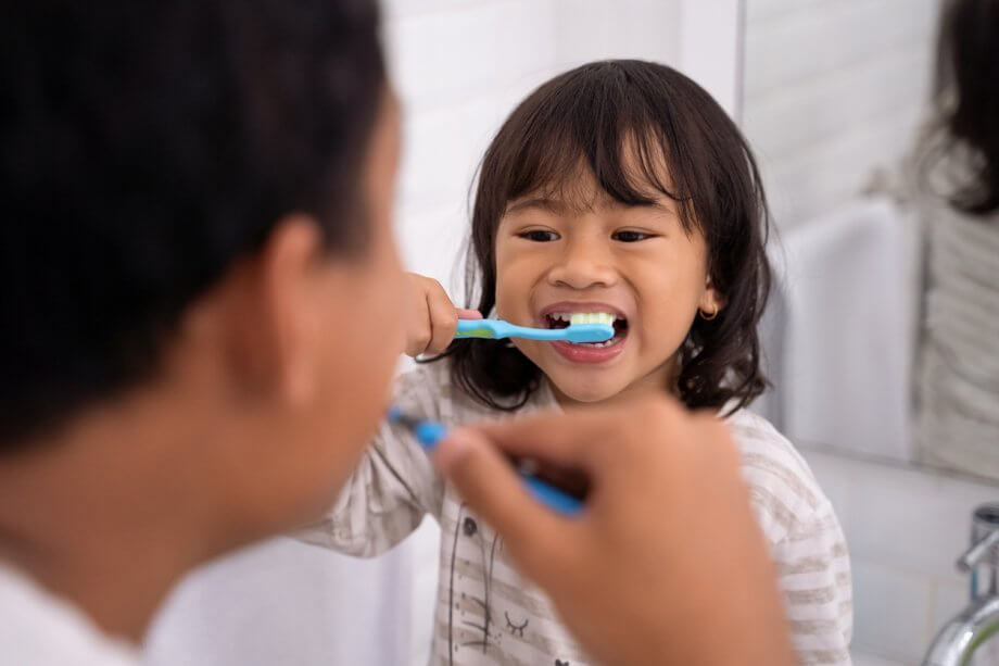 toddler brushing teeth