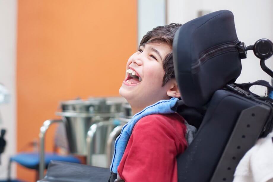 kid with special needs laughing