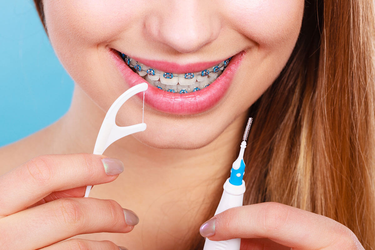 How to Floss Your Teeth With Braces Tender Smiles in NJ